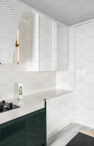 کابینت مدرن بدون دستگیره با طراحی منحنی سفید و سبز در آشپزخانه لوکس